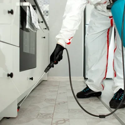 depositphotos_375052130-stock-photo-pest-control-worker-protective-suit