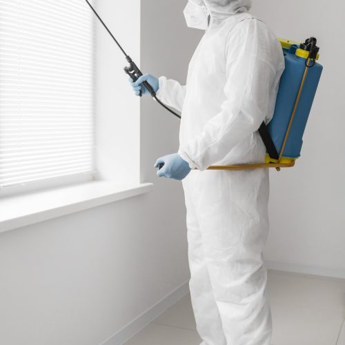 full-shot-man-wearing-protective-suit