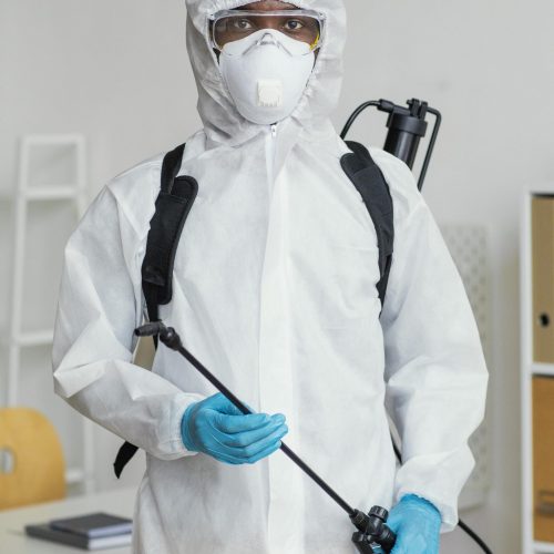 person-protective-suit-getting-ready-disinfect-room