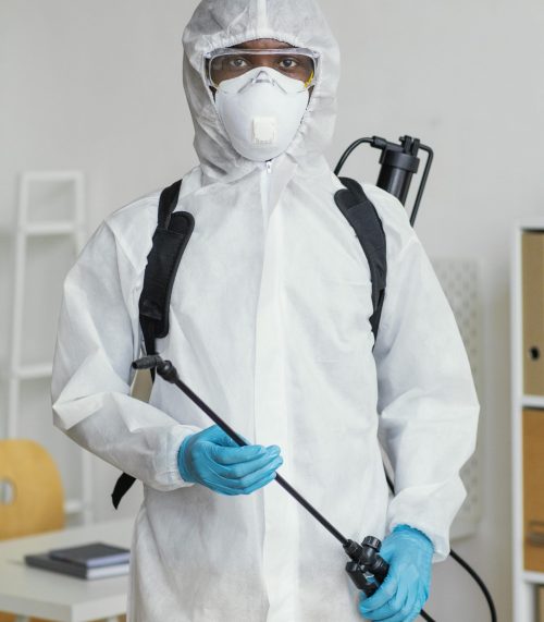 person-protective-suit-getting-ready-disinfect-room